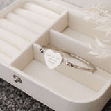 Bangle with heart charm engraved with handwriting
